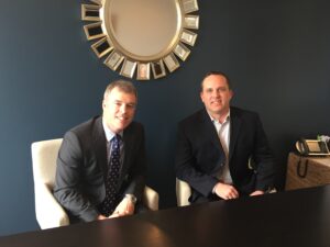 Tim Greene (left), CEO of john greene Commercial, welcomes Cory Ramey to lead the firm's industrial division.