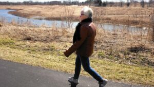 Margi Girdzius, a resident at Medinah on the Lake in Bloomingdale, enjoys access to walking paths right outside her back door. (James C. Svehla, for the Chicago Tribune)
