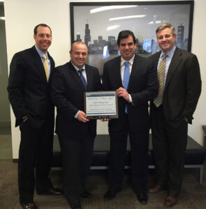 Proper Title announced it recently received the “2014 Rising Star / Excellence in Action” award by Fidelity National Title Group, Inc. (from left to right: Proper Title’s Benjamin Niernberg, Vitaliy Polyakov, Peter Janus and Michael Golden)