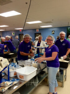 RMK staff and community residents packaged meals for Feed My Starving Children.