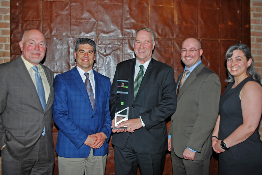 The NEWCITY LLC team accepts the Vision Award in the category of “Mixed-Use Development” at Urban Land Institute Chicago’s Vision Awards in early June.