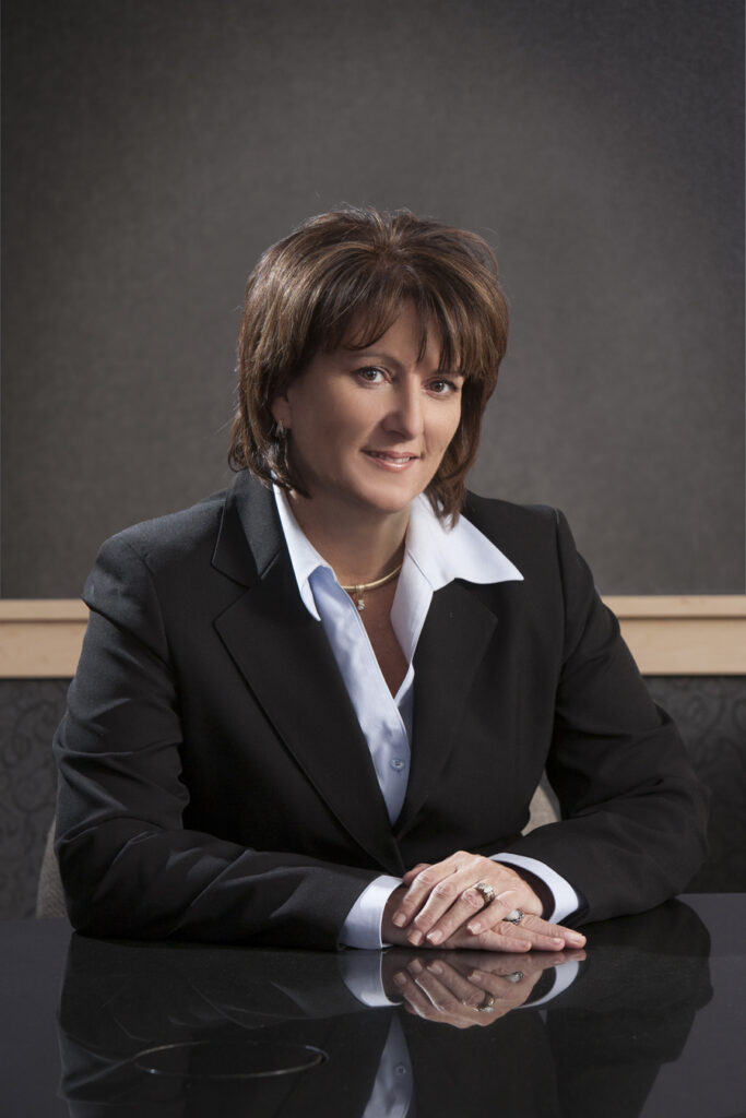 Behind-the-scenes team members, such as Englewood Construction's CFO, Mary Davolt, play a critical role in the success of a commercial construction firm.