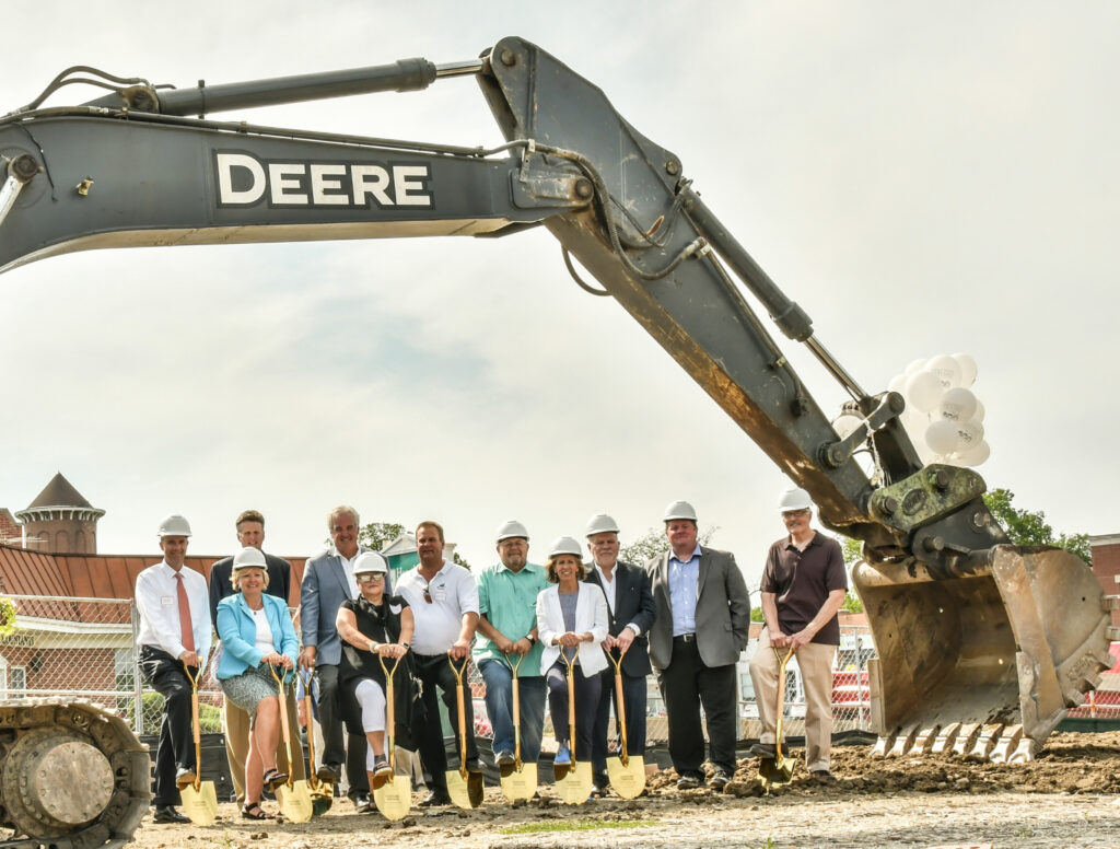 Mark Ptacek, of Heartland Bank; John McFarland, managing director of Foxford Communitie; Ingrid Velkme, village of Western Springs deputy manager; Peter Brennan, president of Foxford Communities; Joan Smothers, managing broker/owner of Smothers Realty; Bob Kumicich, of Cougar Construction; Bill Sifferman, village of Western Springs trustee; Alice Gallagher, village of Western Springs president; Patrick Higgins, village of Western Springs manager; and Martin Scott, village of Western Springs director of community development celebrate the official groundbreaking of Foxford Station in Western Springs (Credit: Bob Briskey Photography).