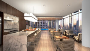 The club room on the 24th floor at 8 East Huron opens to the pool deck and is well-suited for hosting large groups, boasting a demonstration kitchen with oversized island, professional grade appliances and ample room for seating.