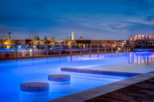 The rooftop deck at AVA NoMa features a resort-style pool and sweeping city views.