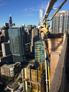 Construction workers at One Bennett Park take in spectacular views from the tower.