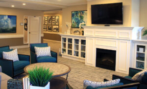 Aspired Living of Westmont features a common living room dedicated to residents receiving Pathway to Living’s A Knew Day memory care and the Spark of Life dementia treatment program.