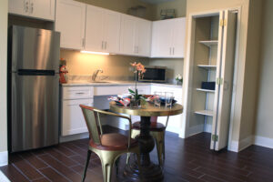 One- and two-bedroom units at Aspired Living of Westmont feature kitchens with stainless steel appliances and an eating area.