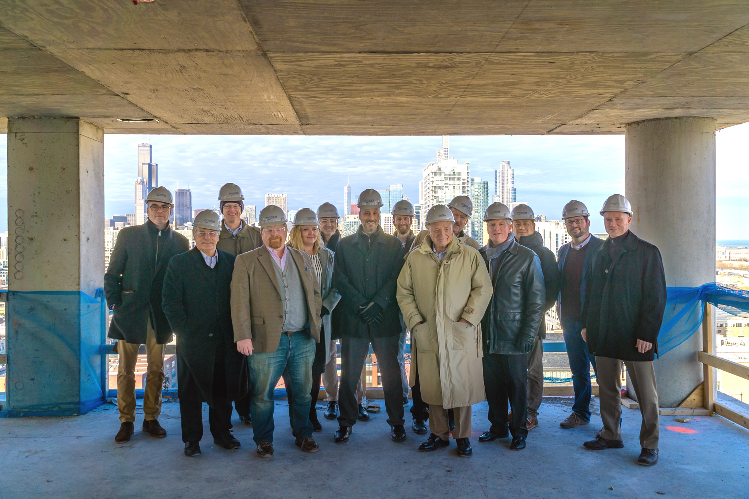 Draper and Kramer Tops Off and Reveals Name of 275Unit Apartment Tower in Chicago’s South Loop