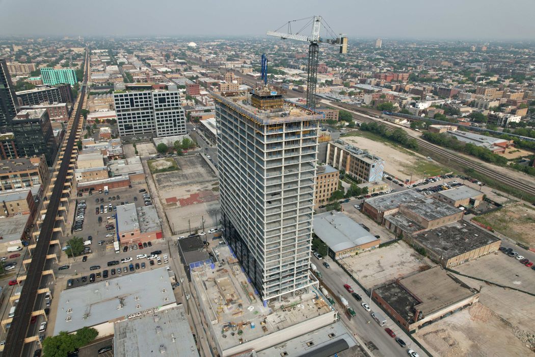 McHugh Construction Announces Topping Off of Two Rental Towers Totaling